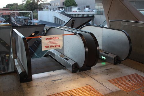 Escalator out of use at North Melbourne station in the leadup to morning peak