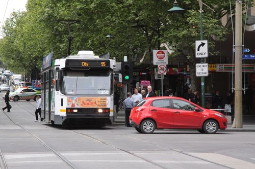 I'm not how the hell this red car ended up at the corner of Bourke and Swanston Streets, but they've managed to block tram A1.250