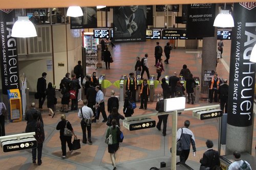 Brand new Myki barriers flaking out at Flagstaff station, Metro staff directing passengers to the overflow readers