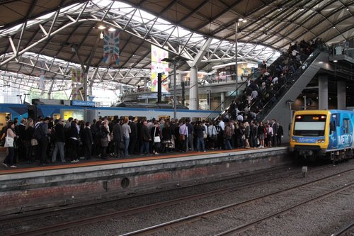 Up train departs an incredibly congested platform 10 at Southern Cross