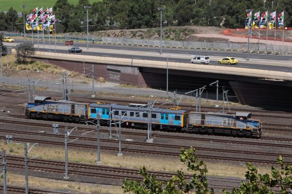 T377 leads T369 and the inspection carriage towards Flinders Street Station from Richmond