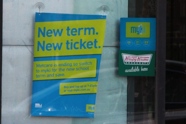 'New  term. New ticket' poster in a 7-Eleven window