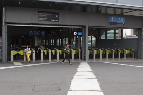 Bank of eight plus seven Myki gates at the western Bourke Street entrance at Southern Cross