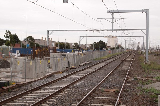 New stanchions in place at the down end over the suburban tracks