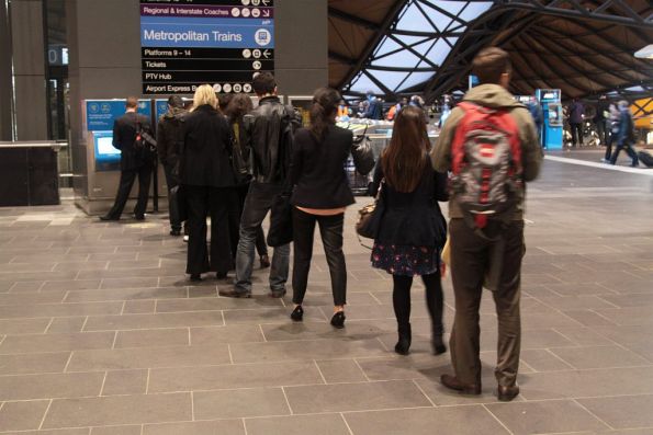 Queue for the Myki machines at Southern Cross in evening peak