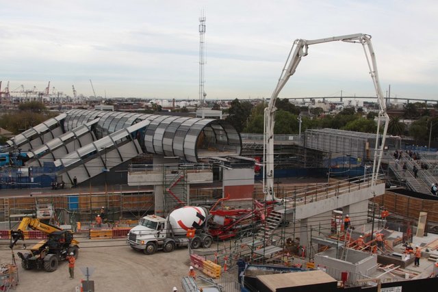 Extending the north end of the footbridge over the future suburban track pair