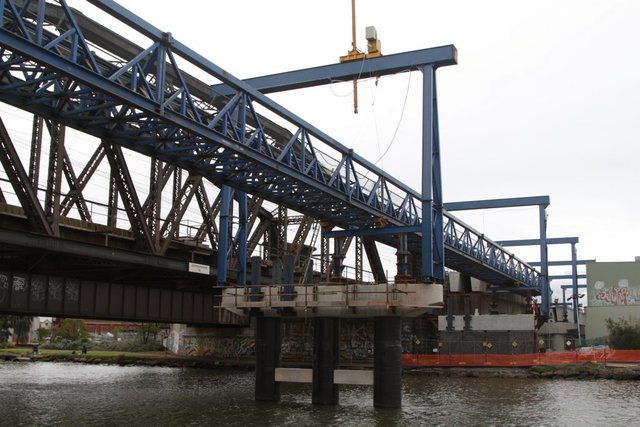 Launching truss in place across the river