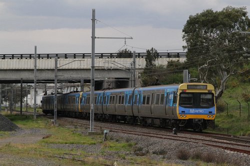 EDI Comeng on an up Cranbourne service passes beneath the Dandenong Bypass overbridge