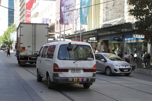 After seeing the traffic jam, the car driver realises they can't continue this way