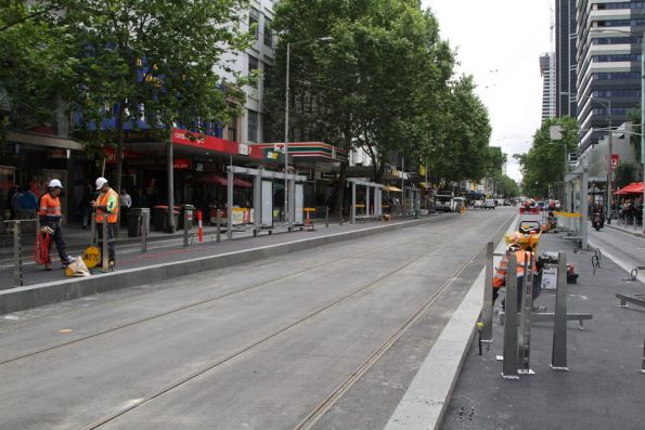 Platform fences being erected at the Elizabeth and Bourke Streets tram stop