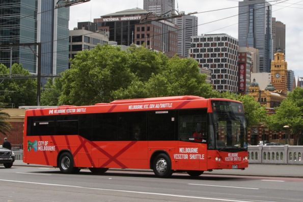 Melbourne Visitor Shuttle bus 6678AO crosses Queens Bridge