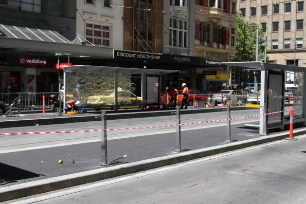 Working on the new platform stop at Collins and Elizabeth Streets