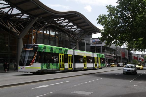 Waiting to turn into Bourke Street, E.6001 outside Southern Cross Station