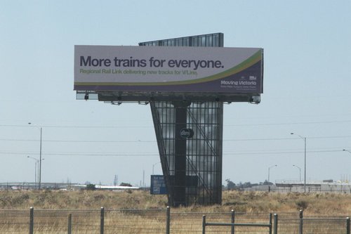 'Moving Victoria' billboard promoting Regional Rail Link beside the Deer Park bypass at Caroline Springs