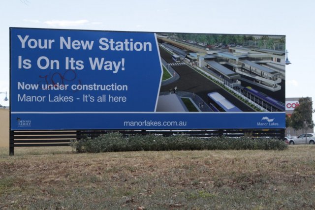 Advertising for the Manor Lakes housing estate, featuring the future railway station