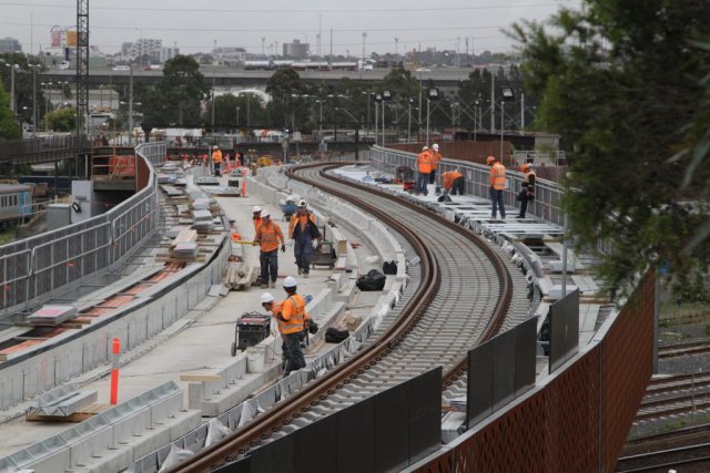 Relaying the North Melbourne flyover as two dual gauge tracks with checkrails