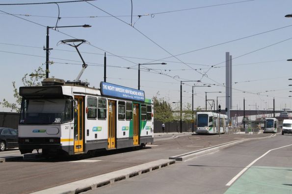 Two C class trams occupy the new Victoria Harbour terminus on Collins Street, with A2.261 waiting