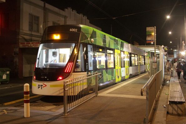 E.6002 on a test run, sitting in the platform stop at Footscray