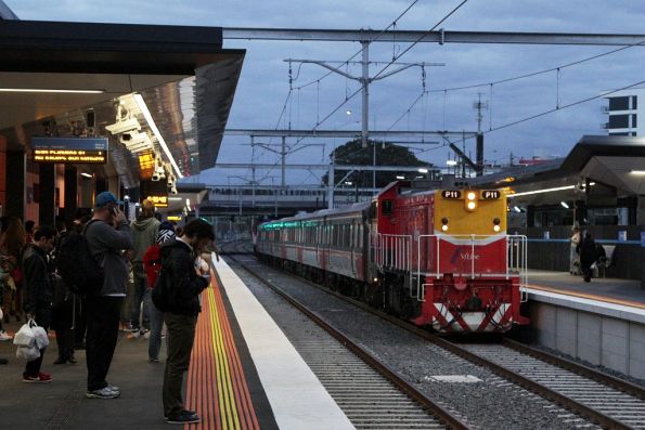 P11 leads a Bacchus Marsh bound push-pull train into the platform at Footscray