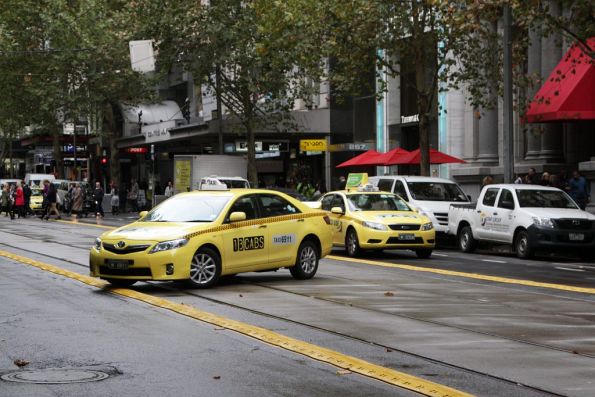 Plastic kerbs along the Collins Street tram stops don't do much to deter taxi drivers from making u-turns