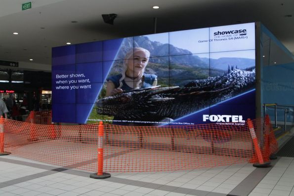 Massive video wall at Flinders Street Station showing Foxtel advertisements, among others