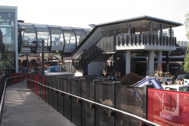 Ramps and stairs link platform 4 and 5 to the overhead concourse