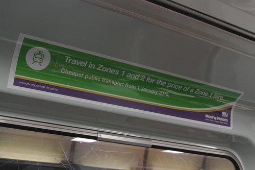 'Moving Victoria' advertisement promoting cuts to public transport fare prices, onboard a Comeng train