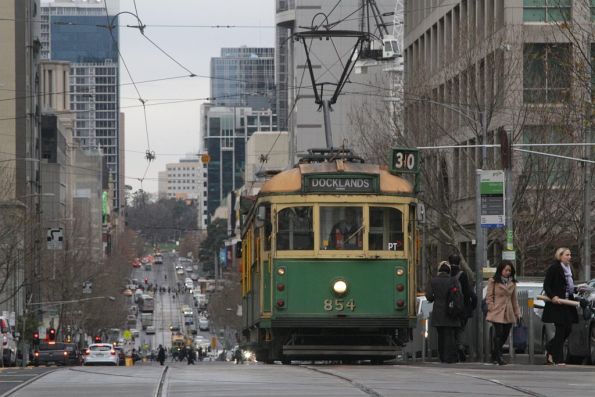 SW6.854 on route 30 heads west at La Trobe and William Streets