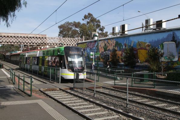 E.6005 picks up citybound route 96 passengers at South Melbourne