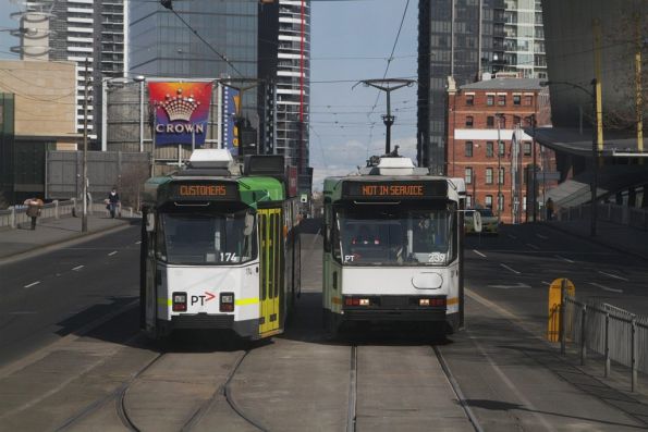 Two out-of-service trams cross paths - Z3.174 and A1.239 on Spencer Street at Batman Park