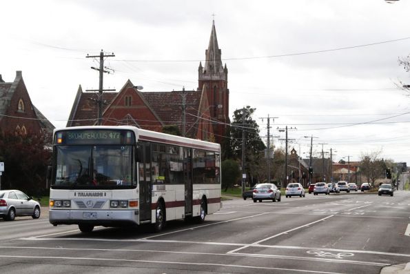 Tullamarine Bus Lines #22 rego 1122AO on a route 477 service arrives at Essendon station