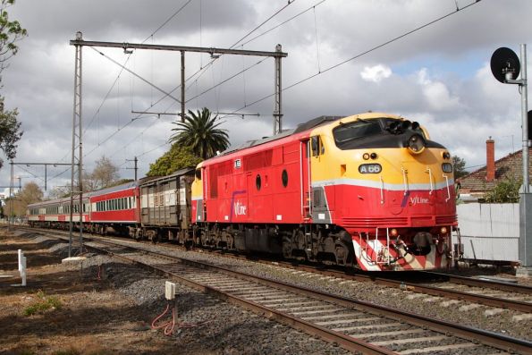 A66 leads a late running down Shepparton service through Moonee Ponds