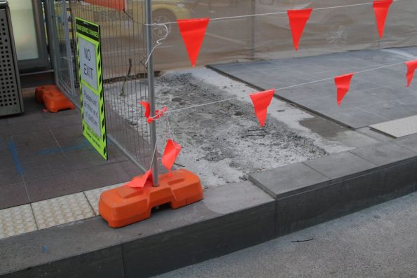 Difference in height between the raised (left) and original (right) sections of the platform stop