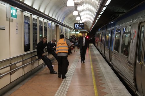 With the bins all removed, extra staff have to clean up after the filthy pigs that catch Melbourne's trains