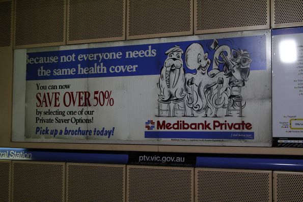 Ancient advertisement for 'Medibank Private' still in place at Melbourne Central platform 1