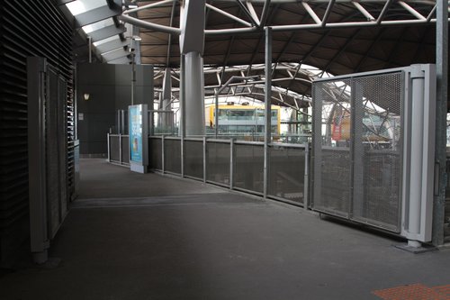 Gates between the V/Line and Metro platforms at the Bourke Street end of Southern Cross are now open