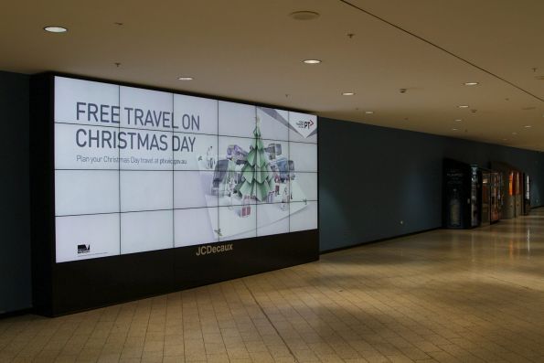 PTV advertisement for free travel on Christmas Day at Melbourne Central station