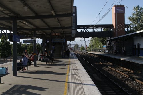 Looking down Watergardens platforms 2 and 3 towards the footbridge