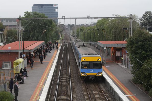 Alstom Comeng passes through Seddon with a down Werribee service