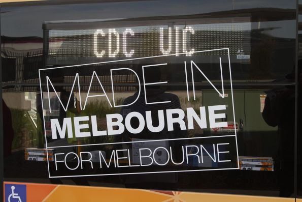 'Made in Melbourne for Melbourne' sign on the side of CDC Melbourne double decker bus #131