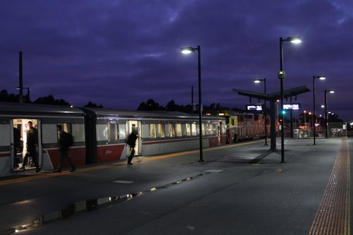 Passengers at Deer Park board at citybound service led by N461