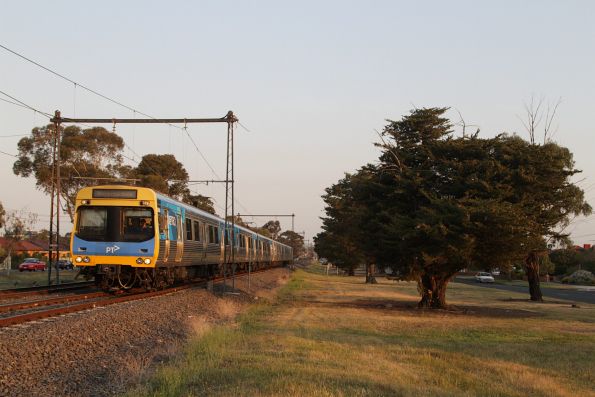 EDI Comeng departs Ginifer station with a down Watergardens service