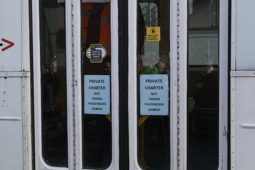 'Private Charter: not taking passengers' notice on the tram doors