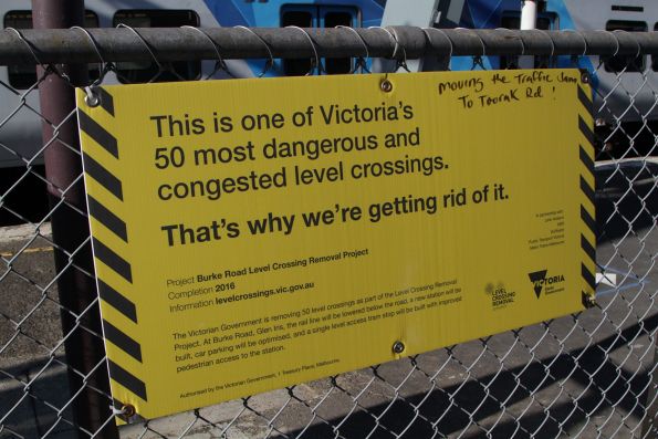 Government signage promoting the Burke Road Level Crossing Removal Project