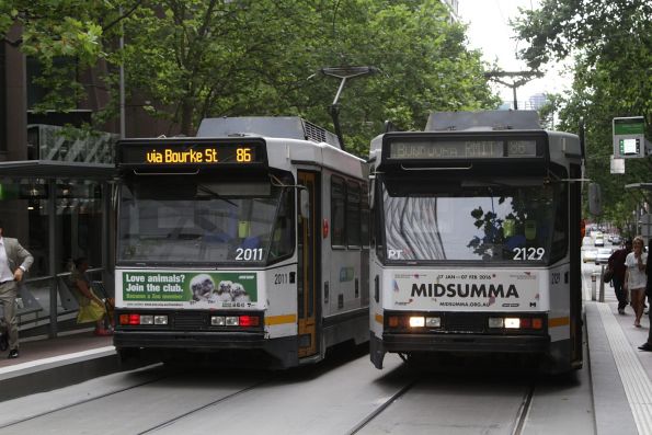 B2.2011 with new LED destination equipment, alongside B2.2129 with the original flipdot displays