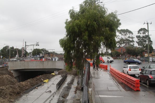 Retaining walls and the Main Road bridge completed, but the trench is yet to be dug either side