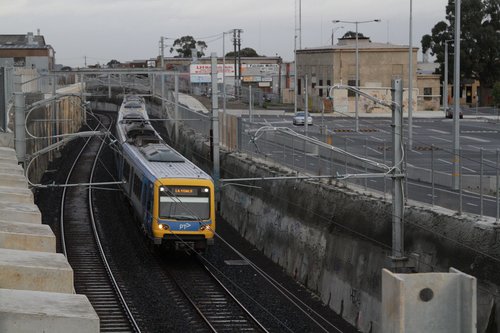 X'Trapolis train approaches Mitcham with a down Lilydale service