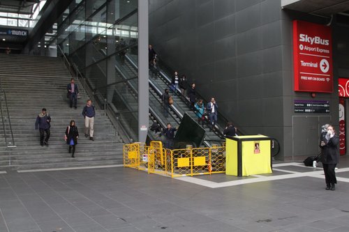 Failed escalator to the Bourke Street bridge under repair at Southern Cross