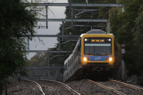 Citybound X'Trapolis train emerges from the Middleborough Road cutting at Box Hill