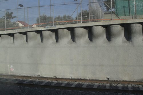 Fresh shotcrete covered walls at Ormond station